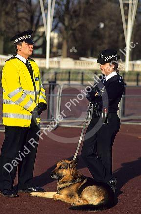 Police dog and officers in London, England.