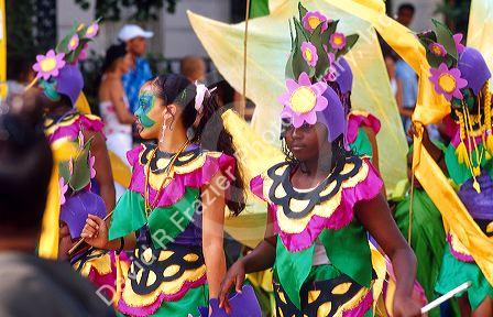 Dancers in the Notting Hill carnival in London, England parade.