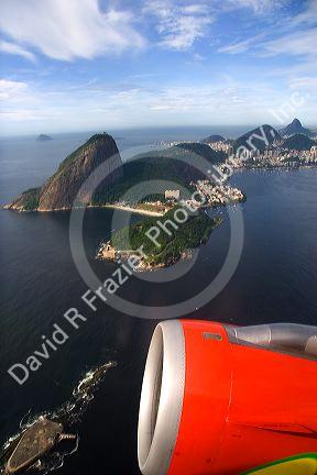 View of Sugar loaf Rock in Rio de Janeiro and jet engine from an airliner in Brazil.