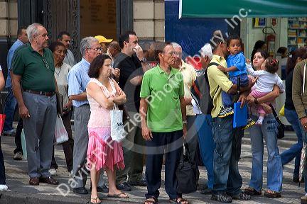 People waiting for a bus in Sao Paulo, Brazil.