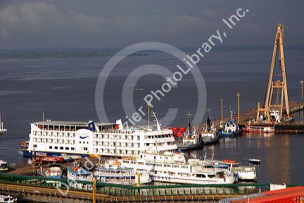 Cruise ships and Amazon river boats docked at Manaus, Brazil.