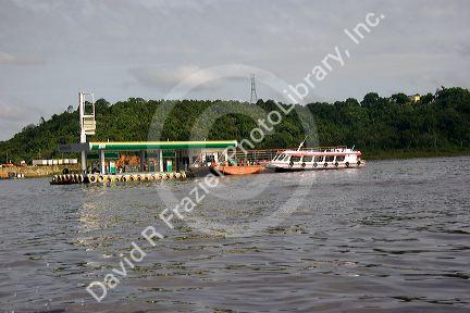 Amazon river boats fuel up at a floating gas station in Manaus, Brazil.
