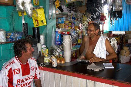 Brazilians at a general store in the Amazon jungle near Manaus, Brazil.