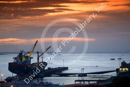 Container ship at sunset at the port in Manaus, Brazil.