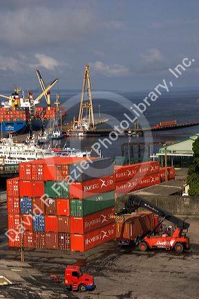 Container ship and containers at the port in Manaus, Brazil.