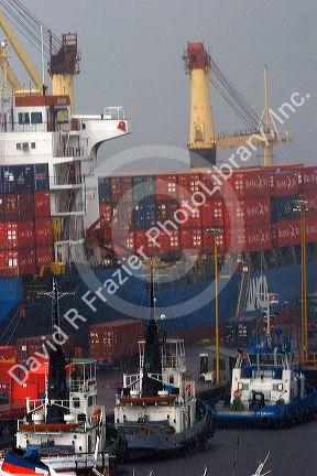 Container ship in the rain at the port in Manaus, Brazil.