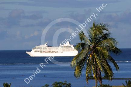 The Paul Gaugin cruise ship off the island of Tahiti.