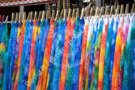Colorful pareu wraps being sold at a market in Papeete on the island of Tahiti.