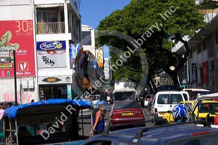 A street scene with traffic in Papeete on the island of Tahiti.