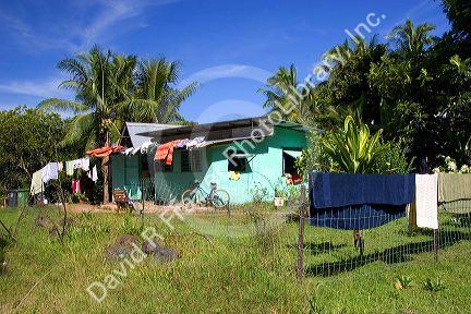 A house with laundry hanging out to dry on the island of Moorea.