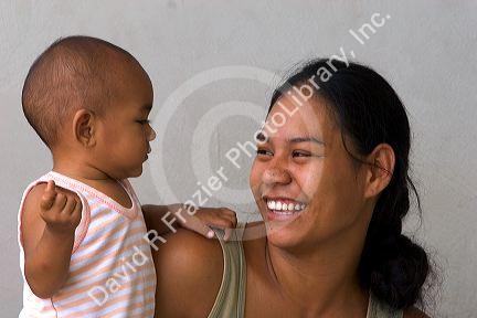 Tahitian mother and child on the island of Moorea.