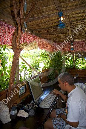 Internet cafe in a grass hut on the island of Moorea.
