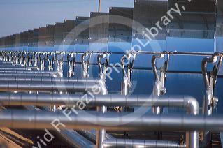 Solar energy concentrators at an electric generation plant in the Mojave Desert, California.