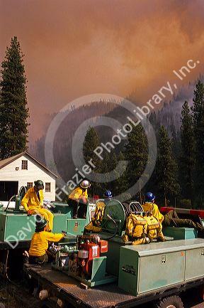 Firefighters watch a forest fire near Lowman, Idaho.