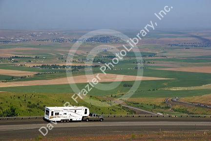 Truck hauling a fifth wheel camper on Interstate 84 near Pendleton, Oregon.