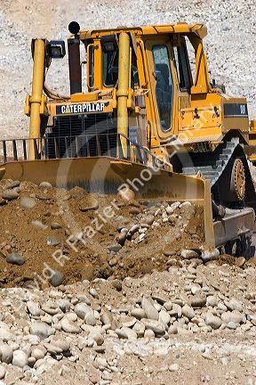 Bulldozer working in a gravel pit near Emmett, Idaho.