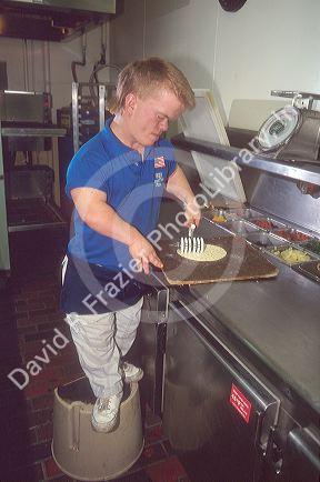Dwarf working as a pizza chef.MR