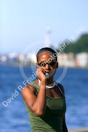 African american woman speaking on a cell phone in Seattle, Washington. MR