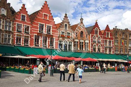 Cafes in The Big Market Square at Bruges in the province of West Flanders, Belgium.