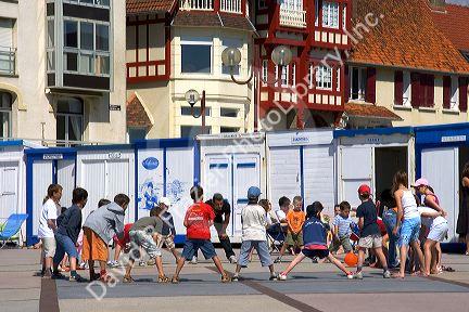 Children play an organized game of ball in the village of Wimereux in the department of Pas-de-Calais, France.