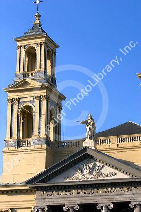 Steeple and jesus atop the Mozes en Aaronkerk Church in the Waterloo Plein area of Amsterdam, Netherlands.