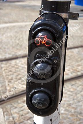 A traffic light showing when it is safe for bicycles to cross the street in Amsterdam, Netherlands.