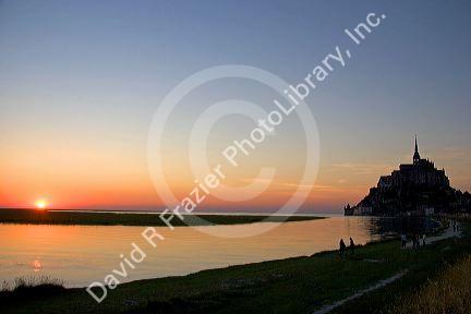 Le Mont Saint Michel at sunset in the region of Basse-Normandie, France.