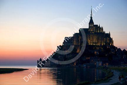 Le Mont Saint Michel at sunset in the region of Basse-Normandie, France.