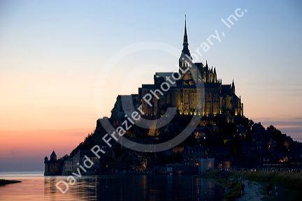 Le Mont Saint Michel at sunset in the region of Basse-Normandie, France.