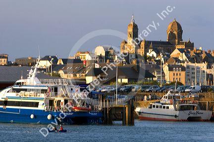 Ferry boats docked in The Harbor of Granville in the department of Manche, France.