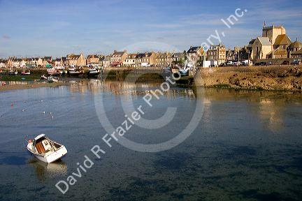 Low tide in the harbor at the village of Barfleur in the region of Basse-Normandie, France.