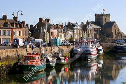 Fishing boats docked in the harbor at the village of Barfleur in the region of Basse-Normandie, France.