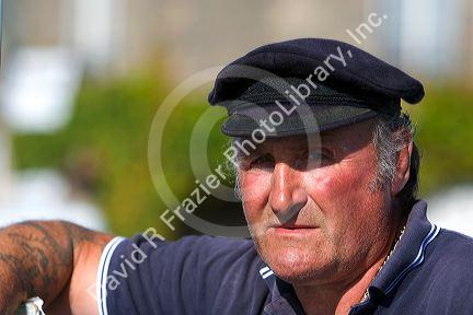 French fisherman in the village of Barfleur in the region of Basse-Normandie, France. 