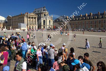 Tourists at the Palace of Versailles in Versailles in the department of Yvelines, France.