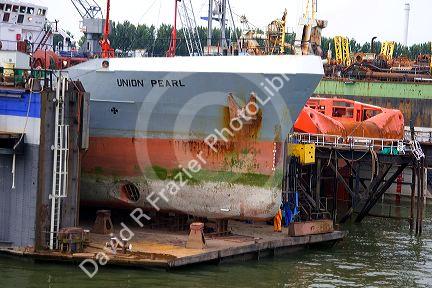 Container ship in dry dock at the Port of Rotterdam, Netherlands.
