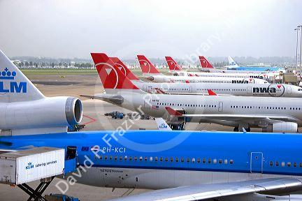Airplanes parked at Schiphol Airport in Amsterdam, Netherlands.