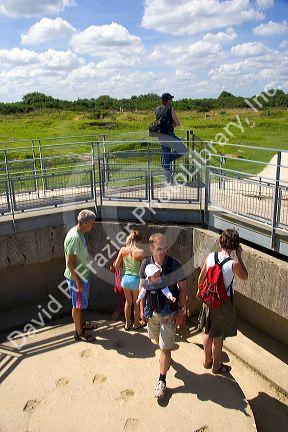 Tourists visit German bunkers on the coast of Normandy in northern France.