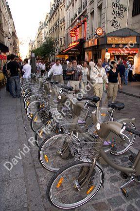 A rack of rental bicycles that are a part of the Velib bike transit system in Paris, France.