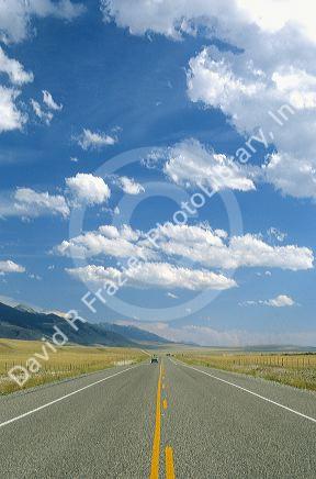 Automobile, care travel on US 287 near Ennis, Montana.