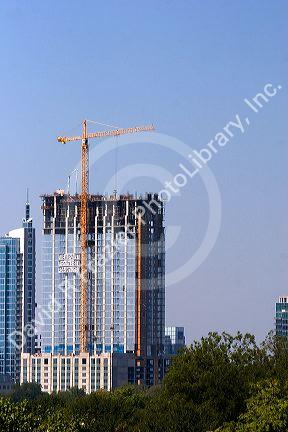 A large crane being used for construction of a new high rise building in Atlanta, Georgia.