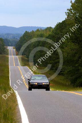 Car traveling on highway 85 south of Manchester, Georgia.