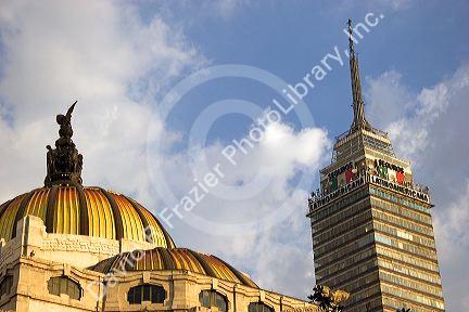 The top of the Torre Latinoamericana building and the Palace of Fine Arts dome in Mexico City, Mexico.