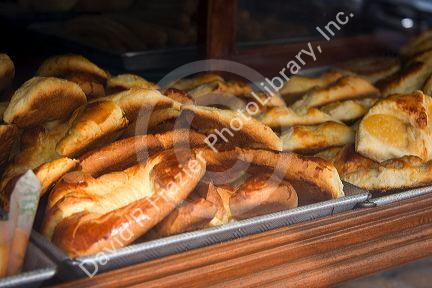 Croissants in the window of a Mexican bakery in Mexico City, Mexico.