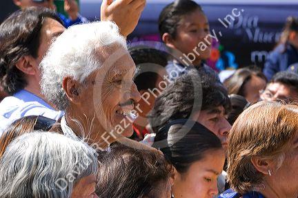 A crowd of Mexican people celebrating the Day of Dead in the Zocalo in Mexico City, Mexico.