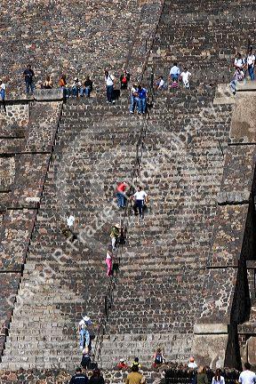 Tourists walk up and down the steps of the Pyramid of the Moon at Teotihuacan in the State of Mexico, Mexico.