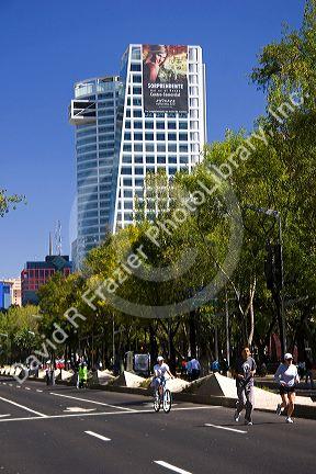 People jogging on the Paseo de la Reforma with no traffic on Sunday in Mexico City, Mexico.