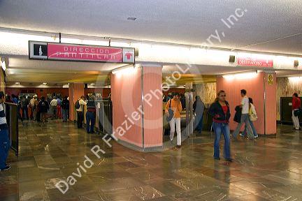 Passengers entering and exiting a Mexico City Metro station, Mexico.