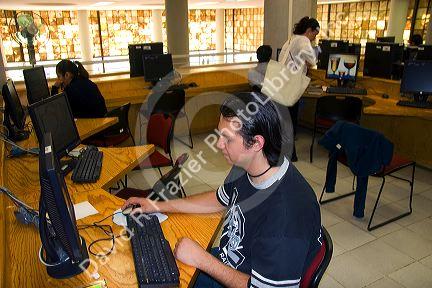 Students do research on computers in the Central Library at the National Autonomous University of Mexico in Mexico City, Mexico.