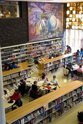 Students study in the Central Library at the National Autonomous University of Mexico in Mexico City, Mexico.