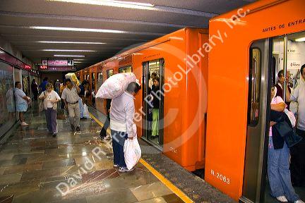 Passengers board the Metro in Mexico City, Mexico.